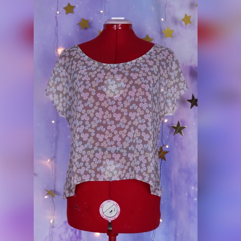 Sheer floral top with white lace back